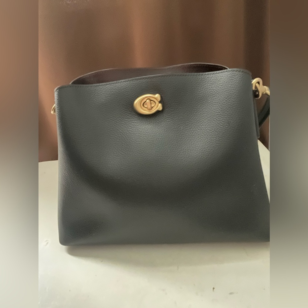 Coach Black Leather Shoulder Bag with Gold Accents